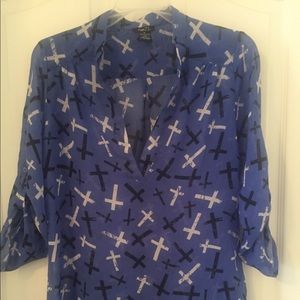 Blue, black, and white blouse